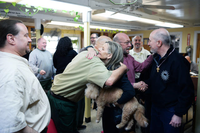 Tracey Tynan hugging a participant in Thrive for Life