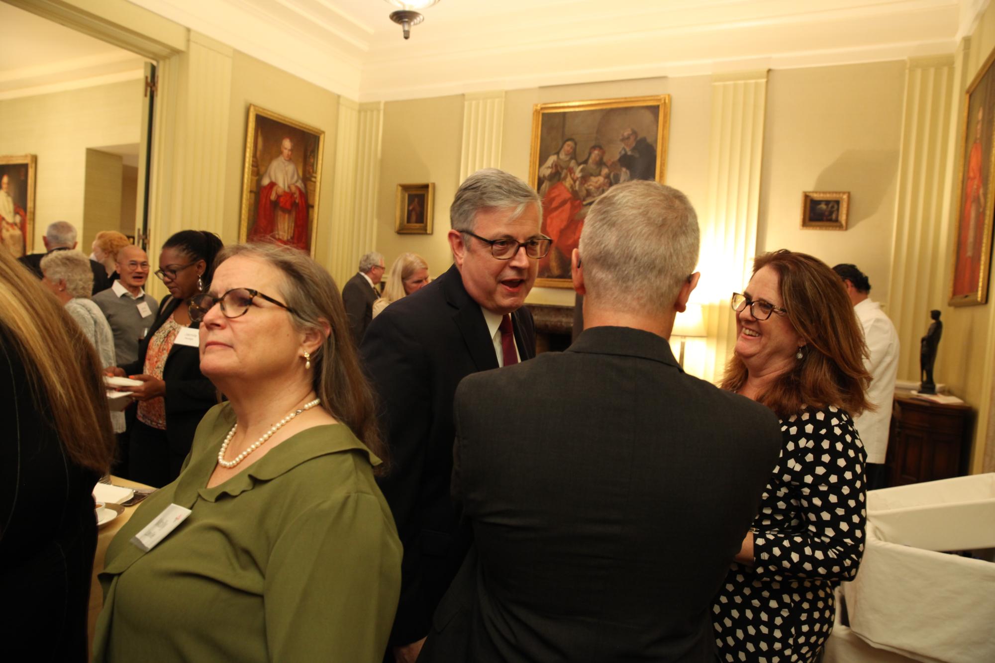 Guests gather in conversation