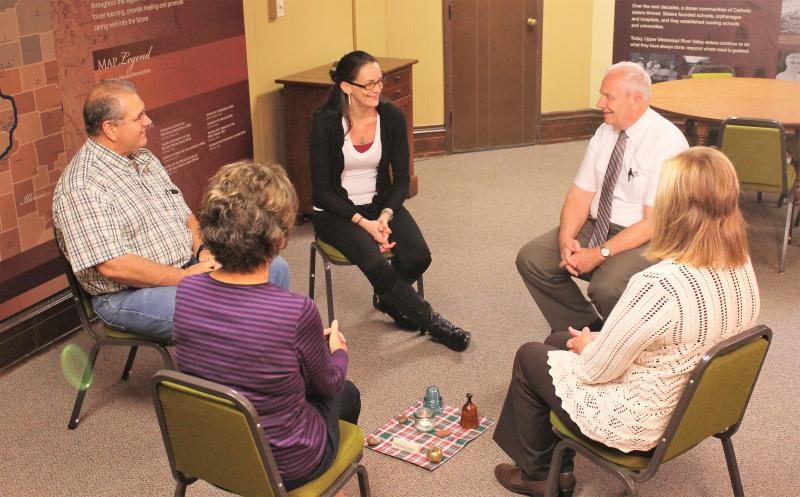 Deacon Tom Lang sits in a peacemaking circle