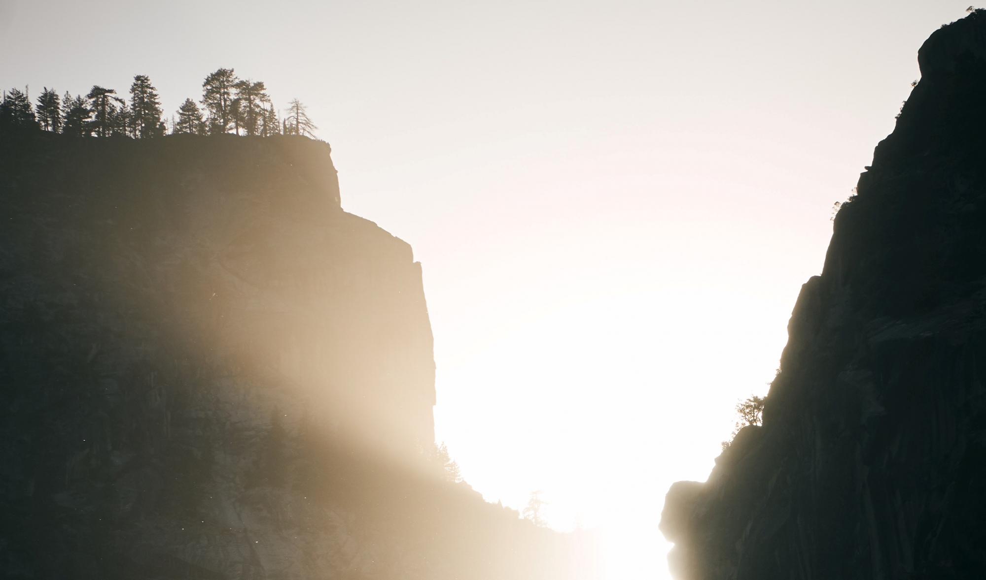 Cliff face with light shining from behind