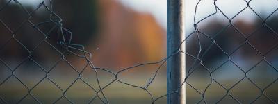 Wire fence with hole in it