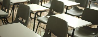 Empty desks in a classroom