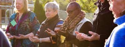 Participants at CMN circle training join in prayer