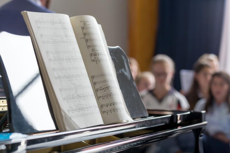 book of music on piano