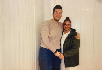 Cody poses with his mom for a photo during a visit in prison