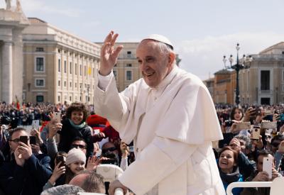 Pope Francis greeting people