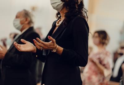 People in pews praying