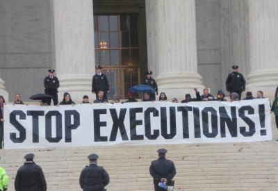 Demonstrators protest the death penalty on the steps of the U.S. Supreme Court